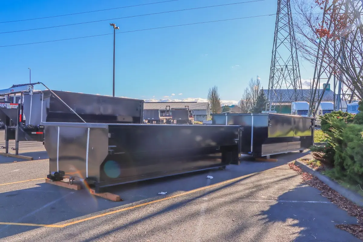 Roll-off dumpster ready for waste disposal at job site for Yard Waste Dumpster Rental in Lee's Summit